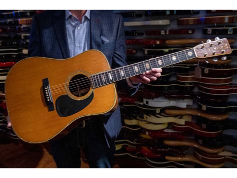 Eric Clapton’s 1968 Martin acoustic fetches $625,000 at auction ...