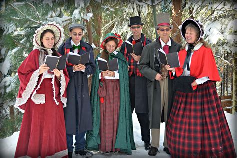 Christmas caroling in 1850's Dickens costumes. | Christmas party themes ...