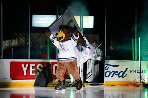 Utah Grizzlies mascot Grizzbee leads the team on to the ice - December ...