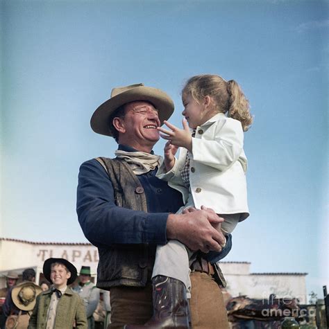 John Wayne And Daughter Aissa On Movie Photograph by Bettmann - Pixels