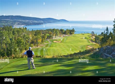 Golfer at Fairmont Le Manoir Richelieu golf course. La Malbaie ...