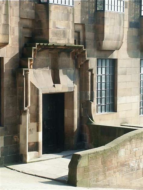 an old building with some windows on the side