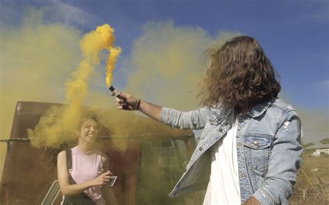 Playing with a yellow smoke bomb - DATACUBE