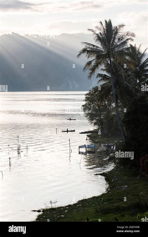 Fishing boats on Lake Toba (Danau Toba) at sunrise, North Sumatra ...