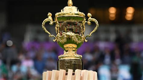 Who is presenting the Rugby World Cup trophy, and who handed it over at ...