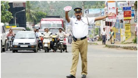 Bengaluru Traffic Police spread awareness on revised fine amounts, hand ...