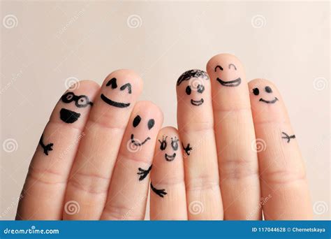 Fingers with Drawings of Happy Faces Stock Photo - Image of hand ...