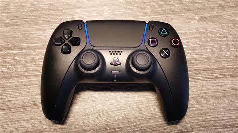 This black PS5 controller is a custom job but it looks good enough for ...