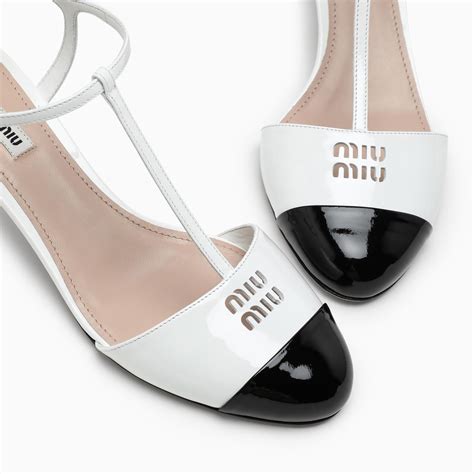 Miu Miu White/black patent leather slingback pumps | TheDoubleF