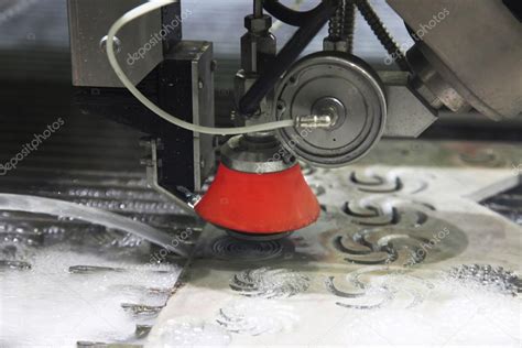 Waterjet cutting of metal Stock Photo by ©spopov 111326094