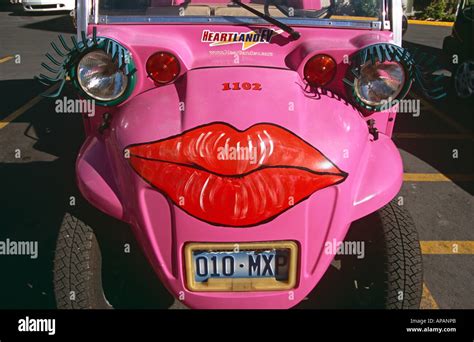 Brightly coloured car, with large painted lips, and eyelashes, Las ...