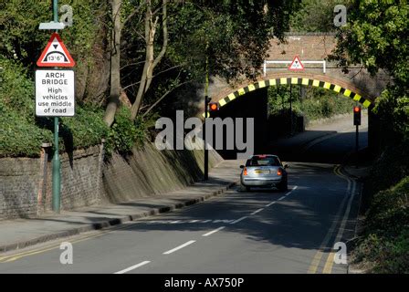 UK bridge clearance height warning sign. Low bridge concept, red ...