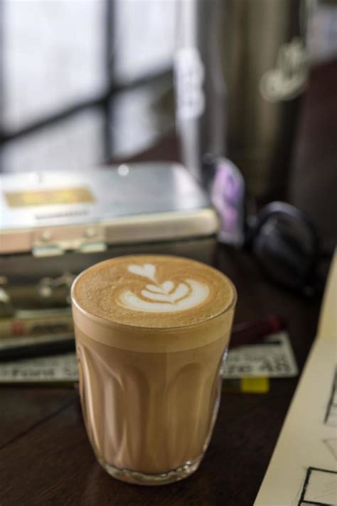 coffee latte art in coffee shop 11041527 Stock Photo at Vecteezy