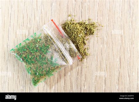 small plastic bag containing marijuana powder (cannabis Stock Photo - Alamy