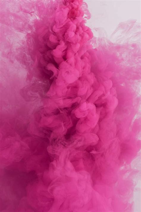 Pink smoke effect on a white background