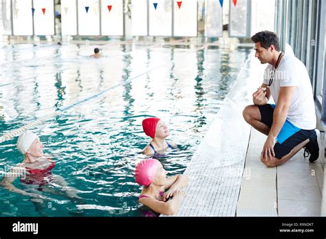 Training in swimming-pool Stock Photo - Alamy