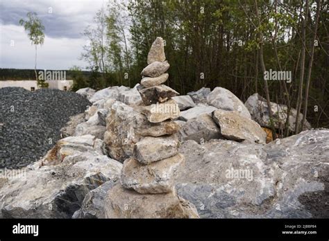 Pyramid made of stones. Piles of pyramids of stones in a former marble ...