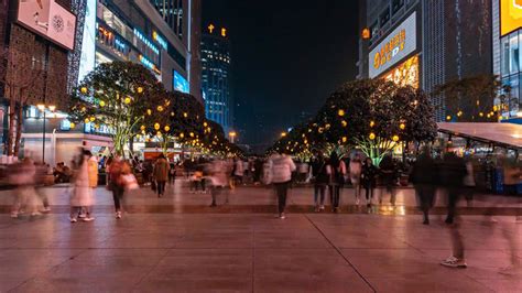 Simple Pedestrian Street At Night Crowded With People Coming And Going ...