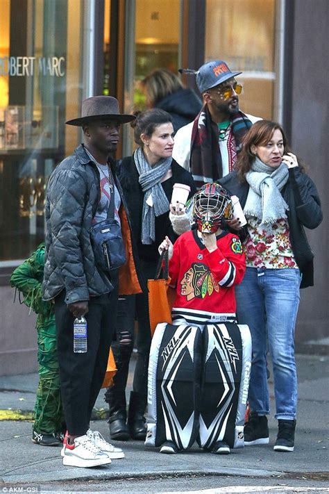 Idina Menzel and Taye Diggs take son Walker out trick or treating in ...