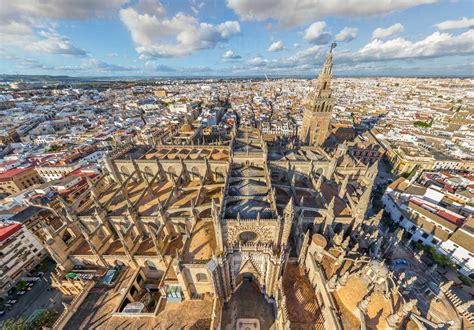 Aerial view of the Cathedral of Saint Mary of the See, Seville, Spain ...