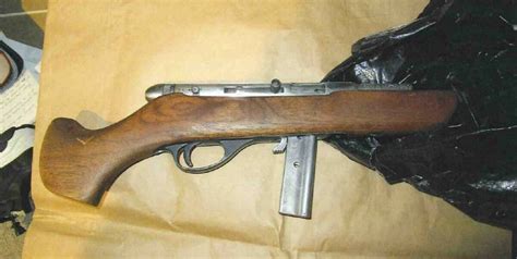 Banks man arrested after sawn-off rifle, crossbow found in late night ...