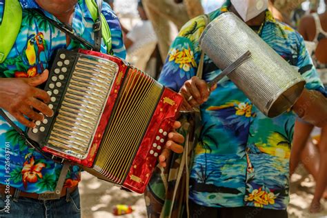 Dominican Republic. Beach musicians. Merengue music. Playing the ...