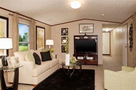 a living room filled with furniture and a flat screen tv