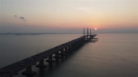 Aerial view sunrise of Penang Bridge 8617992 Stock Video at Vecteezy