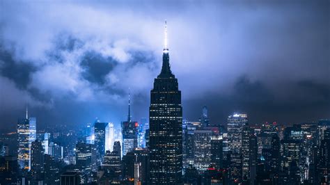 High Rising Buildings Of New York Under Cloudy Sky During Nighttime HD ...