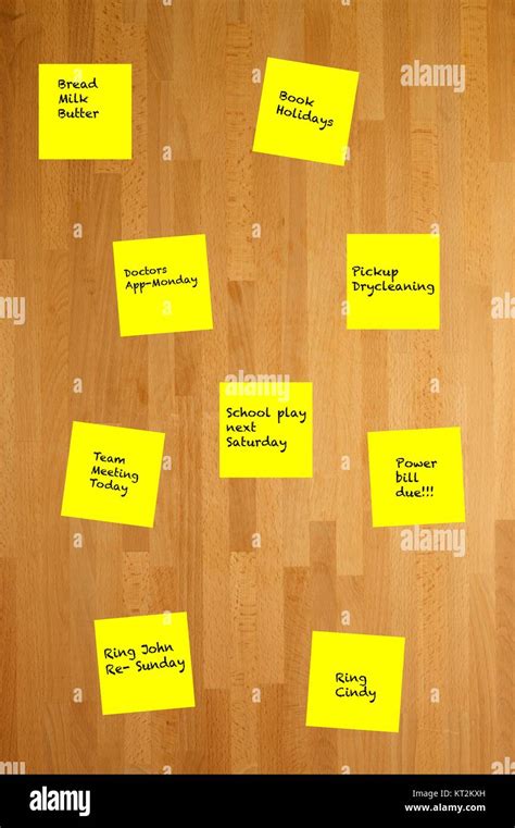 Post it notes stuck to a wooden wall Stock Photo - Alamy