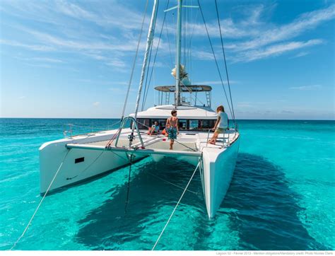 Freedom Luxury Charter Sailing Catamaran Guests bow* | Select Yachts