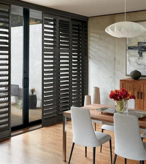 Black sliding glass doors with blinds - kobo building