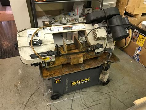 CRAFTEX CX103 7'' X 12'' HYDRAULIC METAL CUTTING BAND SAW - Able Auctions