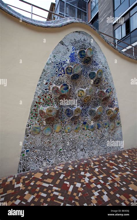 Barcelona Gaudi Casa Batllo patio wall mosaic Stock Photo - Alamy