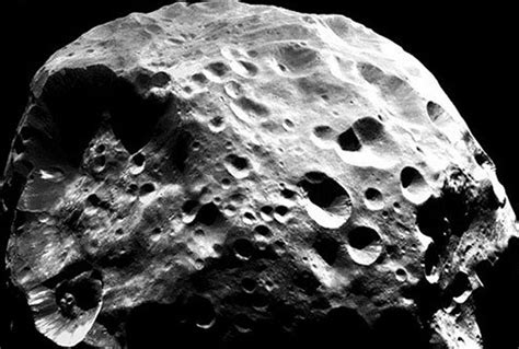 Hyperion 'Cosmic Hamburger': Strange Moon Of Saturn With Even Stranger ...