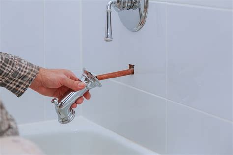 How To Replace A Bathtub Faucet In 4 Easy Steps