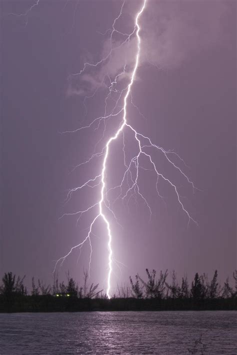 Cloud-to-ground Lightning Strike Photograph by Mike Theiss