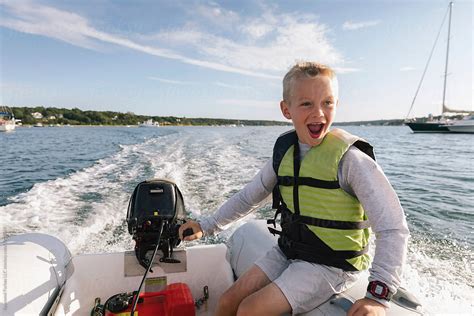 "Smile Boy Driving Boat For The First Time On Ocean In Dinghy" by ...