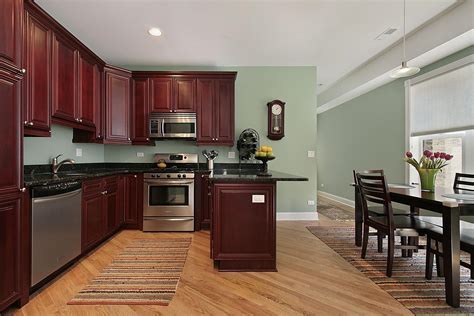 Light Sage Green Paint Colors In Kitchen With Dark Mahogany Cabinets ...