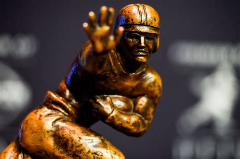 Why they call it the Heisman Trophy - nj.com