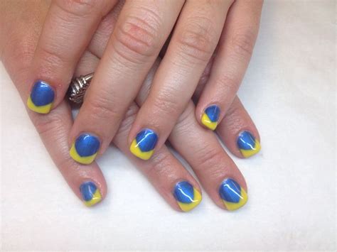 Blue and yellow nails | Yellow nails design, Blue nail art, Yellow nails