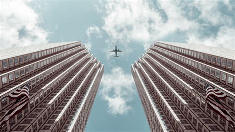 Plane Between Two Buildings 5k Wallpaper,HD Photography Wallpapers,4k ...