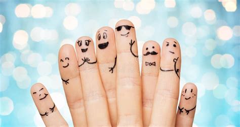 Close Up of Hands and Fingers with Smiley Faces Stock Image - Image of ...