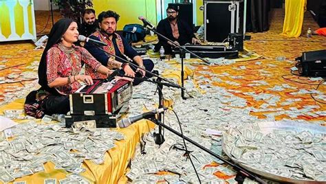 Watch: Gujarati folk singers showered with cash; raise Rs 2.5 crore for ...