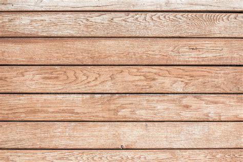 Top view of light brown wooden background with horizontal planks ...