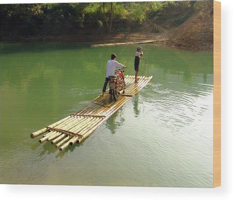 Bamboo Raft To Cross River With Wood Print by Tristan Savatier - Photos.com