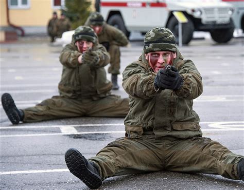 Officers of Russia's Federal National Guard Service (Rosgvardia) take ...