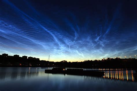 Understanding the Glow of Noctilucent Clouds