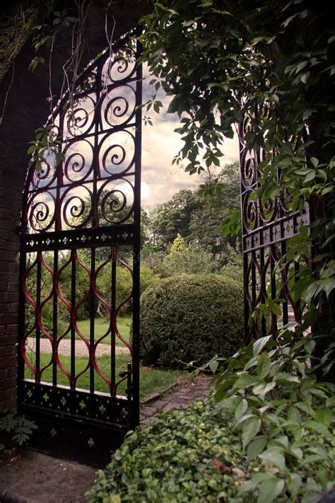 Garden with an Open Gate stock photo. Image of entrance - 12567912