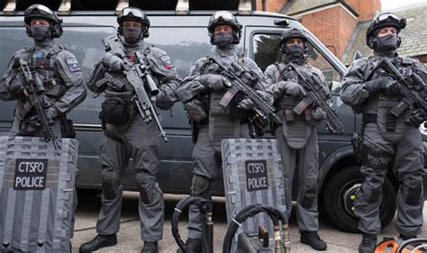 Armed police roaming streets London over fear of Paris-style attacks ...